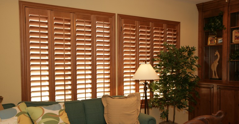 Wood shutters in Honolulu living room.